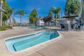 Lake Elsinore apartment for rent - our apartments have a swimming pool and a patio with umbrellas