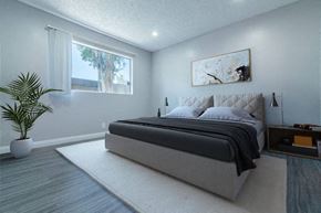 Highland apartment for rent - a bedroom with a large bed and a large window