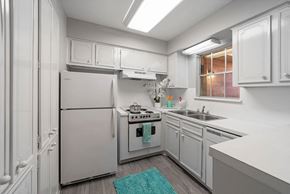 Beaumont apartment for rent - Kitchen With White Cabinetry And Appliances at Longfellow Apts, Beaumont