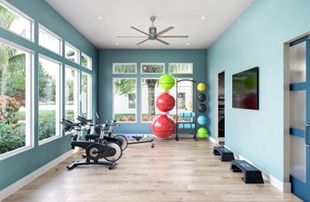 24-Hour fitness center with yoga and spin room
