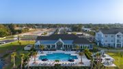 Palm Bay apartment for rent - an aerial view of a large house with a swimming pool