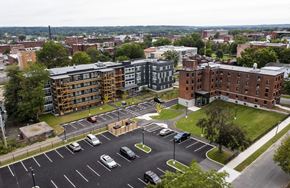Holyoke apartment for rent - an aerial view of a city street with cars and buildings