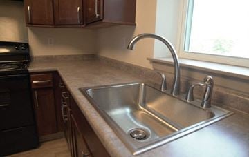 Holyoke apartment for rent - a stainless steel sink in a kitchen next to a window