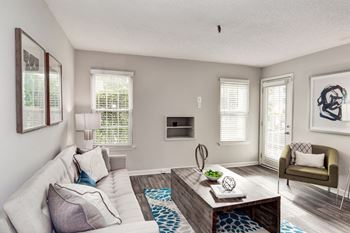 A living room with a couch and a coffee table
