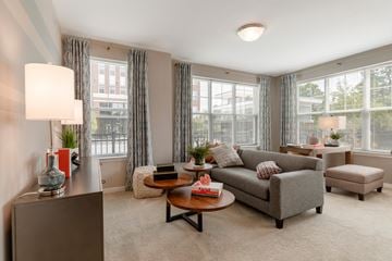 Elkridge apartment for rent - a living room with a couch and a table