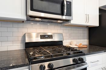 Granite countertops and tile backsplashes