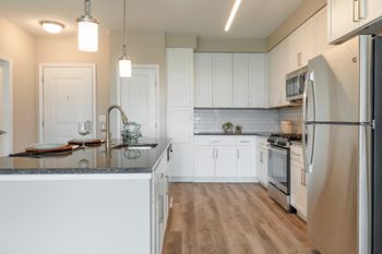 White, soft-close solid wood cabinetry