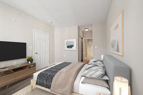 Camp Springs apartment for rent - a bedroom with a large bed and a tv  at MetroPlace at Town Center, Camp Springs, 20746