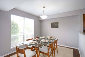 Landover apartment for rent - Dining room with glass table and six chairs at Villages at Morgan Metro Apartments, Landover, MD