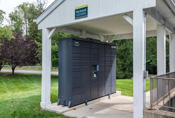 Hub package locker system under white shelter