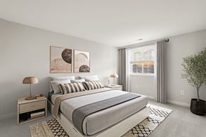 Ellicott City apartment for rent - a bedroom with a bed and a window at Ellicott Grove, Ellicott City, MD 21043