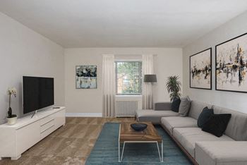 A living room with a couch and a coffee table
