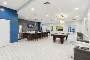 Landover apartment for rent - Recreation room with pool table and kitchen bar at Villages at Morgan Metro Apartments, Maryland, 20785