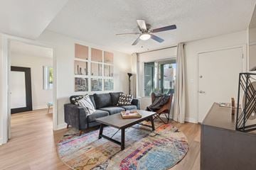 Chandler apartment for rent - A living room with a grey couch and a coffee table.