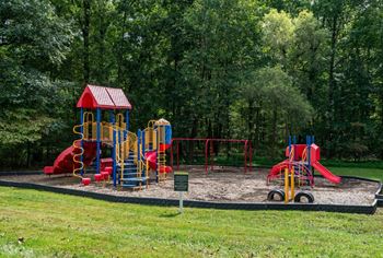 Playground area with colorful equipment and swings