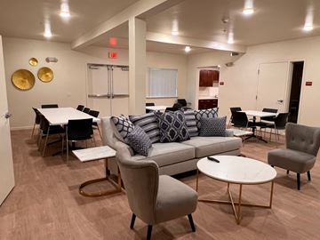 Santa Cruz apartment for rent - a living room with a couch and chairs and tables