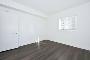 American Canyon apartment for rent - a bedroom with white walls and wood floors and a window