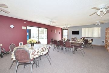 Nyssa apartment for rent - A dining room with a table set for six people.