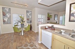 Sacramento apartment for rent - a spacious kitchen and dining room with a table and chairs