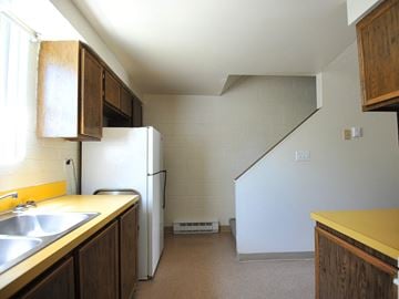 Mt. Home apartment for rent - a kitchen with a sink and a refrigerator