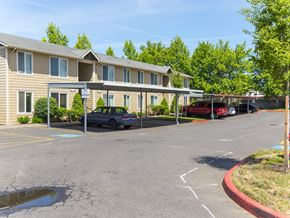 Gresham apartment for rent - an empty parking lot in front of an apartment building