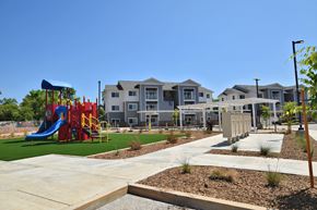 Oroville apartment for rent - an image of the playground at the whispering winds apartments in pearland, tx