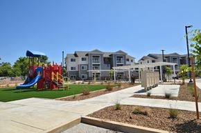 Oroville apartment for rent - an image of the playground at the whispering winds apartments in pearland, tx