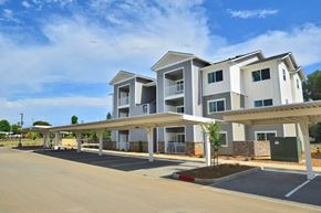 Oroville apartment for rent - a row of apartment buildings with a blue sky in the background