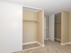 Portland apartment for rent - an empty bedroom with a closet and two closets
