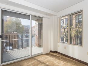 Portland apartment for rent - a living room with a balcony and a sliding glass door