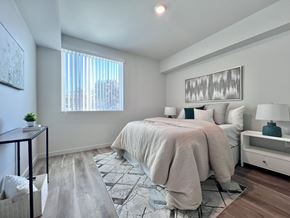 Bay Point apartment for rent - A bedroom with a large bed and a window.