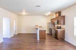 Tigard apartment for rent - Atwater kitchen bar and living area