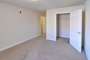 Truckee apartment for rent - a bedroom with a closet and an open door