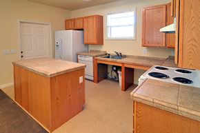 Truckee apartment for rent - a kitchen with a stove and a refrigerator