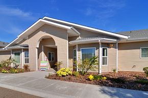Red Bluff apartment for rent - the exterior of a building with a sign in front of it