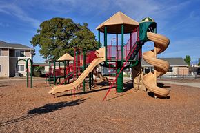 Anderson apartment for rent - a playground with a slide in a park