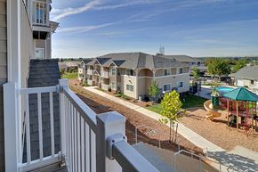 Oroville apartment for rent - a view of apartments from a balcony with a pool