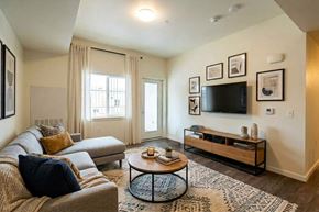 Gridley apartment for rent - A living room with a couch, a coffee table, and a television.