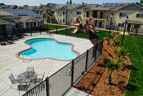 Winters apartment for rent - a swimming pool in front of an apartment complex