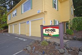 Portland apartment for rent - a building with a piccolo colina sign in front of it