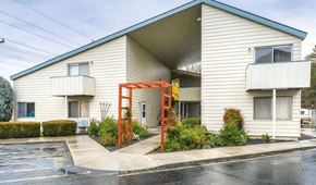 Ontario apartment for rent - A house with a red ladder in front of it.
