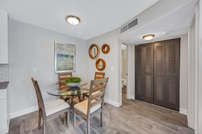 Tampa apartment for rent - A dining room with a glass table and chairs.