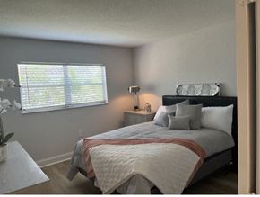 Port Richey apartment for rent - a bedroom with a bed and a window