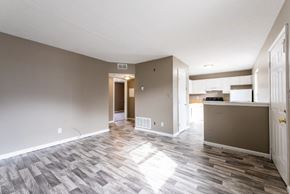 Louisville apartment for rent - A room with a wooden floor and a white ceiling.
