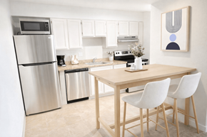 Colorado Springs apartment for rent - A kitchen with a table and chairs.
