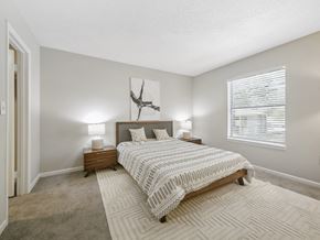 Macon apartment for rent - a bedroom with a bed and a window