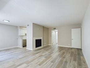 Encino apartment for rent - Apartments in Encino, CA - Living Room with Fireplace and Dining Room