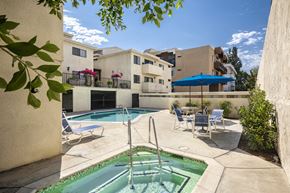 Sherman Oaks apartment for rent - Apartments in Encino, CA - Pool and Patio with Jacuzzi plus Lounge Chairs and Tables with Umbrellas