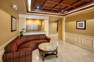 Hollywood apartment for rent - a living room with a couch and a coffee table