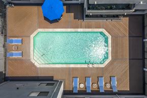 Valley Village apartment for rent - Apartments in Valley Village, CA - Aerial View of Pool, Patio with Lounge Chairs Umbrellas Table and Chairs